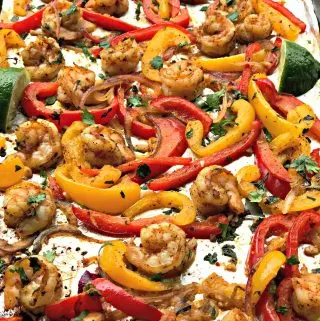 overview of shrimp fajitas on a baking sheet