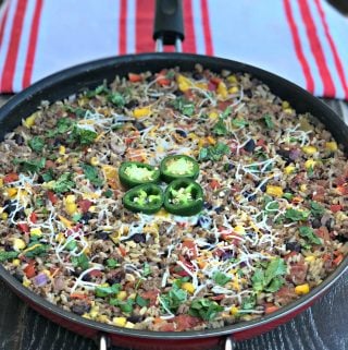 beef taco quinoa and brown rice in a skillet