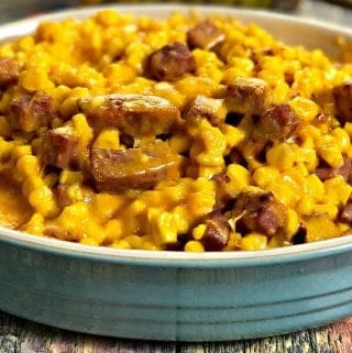 Instant Pot Baked Cheesy Corn with Ham served in a dish