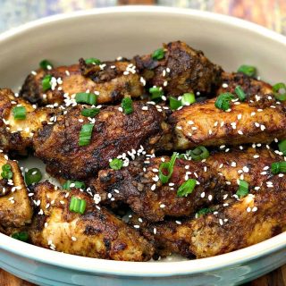 air fryer thai chili fried chicken wings in a serving dish