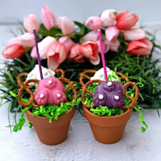 easter bunny butt pretzel candy with tulips and grass in small pails