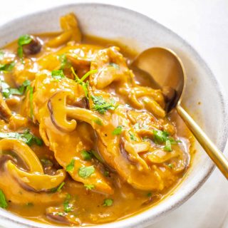 instant pot chicken marsala in a serving dish on a multi color surface