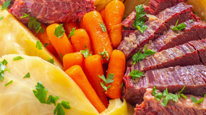 Instant Pot corned beef and cabbage on a white plate