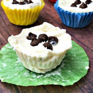 cheesecake fat bombs on a flat surface