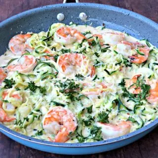 low carb zucchini alfredo in cream sauce in a skillet