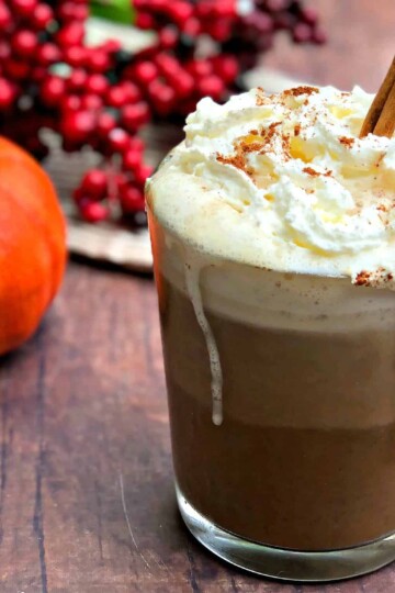 keto pumpkin spiced latte in a glass mug with whipped cream