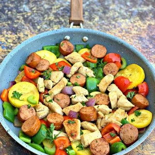 cajun chicken sausage and vegetables in a skillet