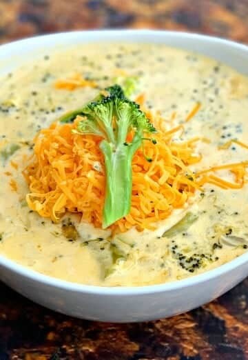 keto low carb instant pot broccoli cheddar soup in a white bowl