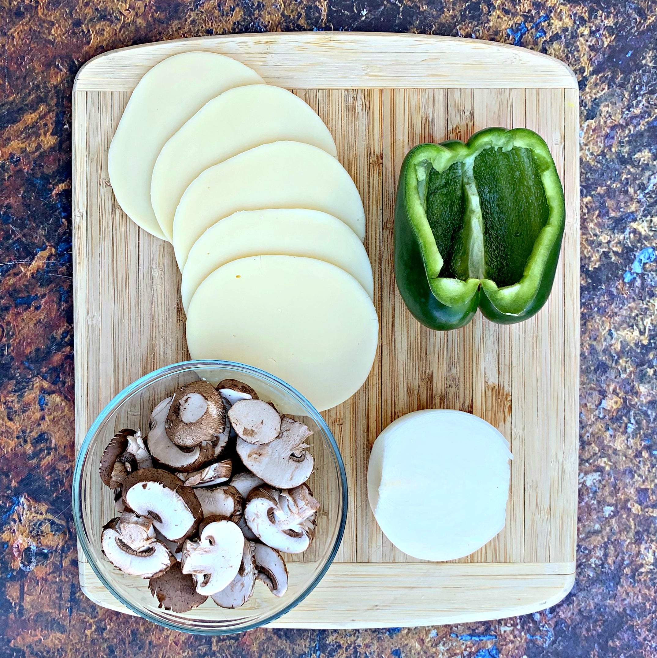 green peppers, cheese, mushrooms, and onion for keto low carb philly cheesesteak