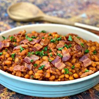 instant pot baked beans with bacon in a blue bowl