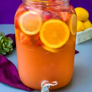 jungle juice cocktail recipe in a 2 gallon glass container