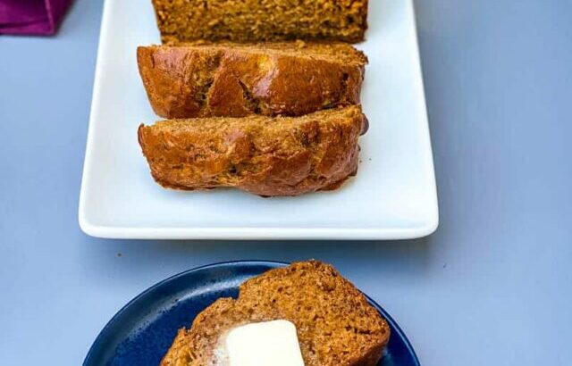 healthy banana bread sliced on a white plate