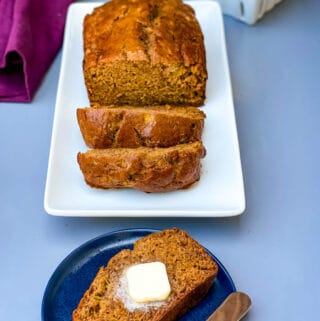 healthy banana bread sliced on a white plate