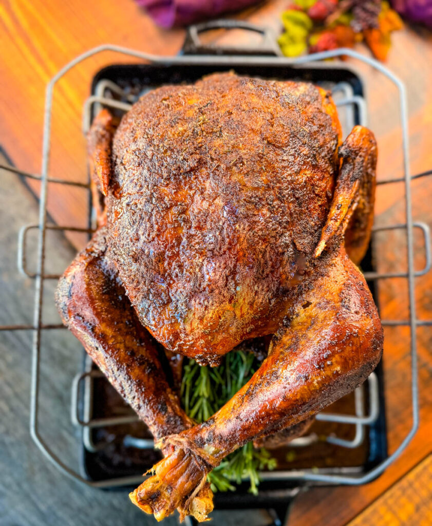 roasted Cajun seasoned turkey in a roasting pan