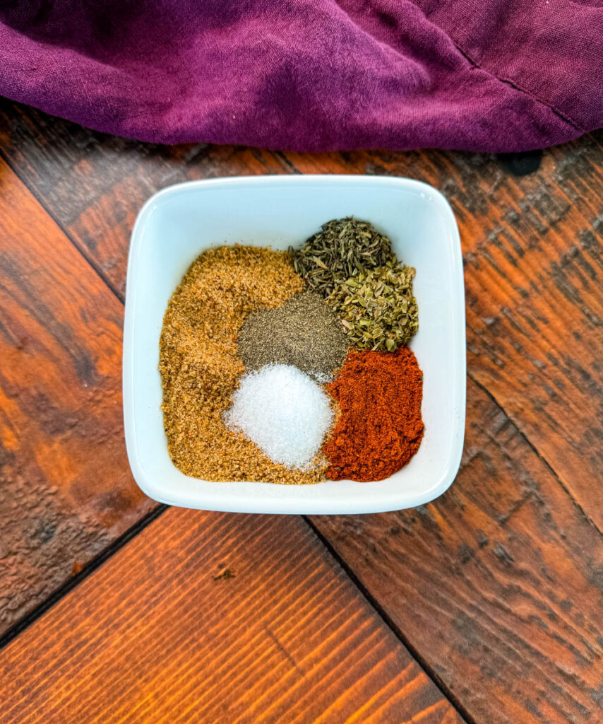 homemade Cajun rub spices in a white bowl