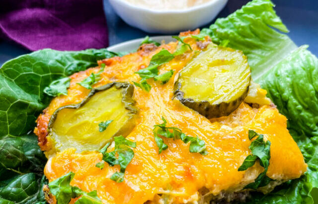 a slice of Big Mac Casserole on a bed of lettuce with Big Mac Sauce