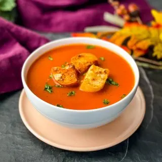 Instant Pot tomato soup in a white bowl