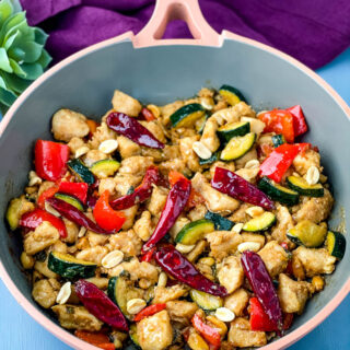 Panda Express copycat kung pao chicken on a skillet pan