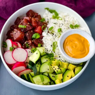 ahi tuna poke in a white bowl