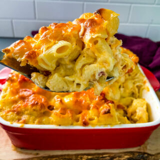 a large spoonful of lobster mac and cheese