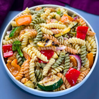 vegetable pasta salad in a white bowl