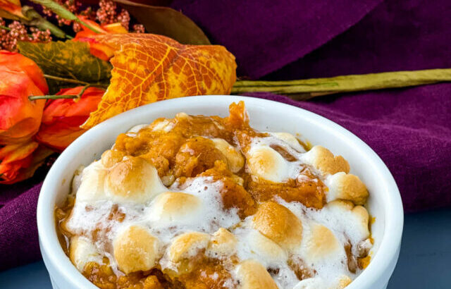 sweet potato casserole with marshmallows in a white dish