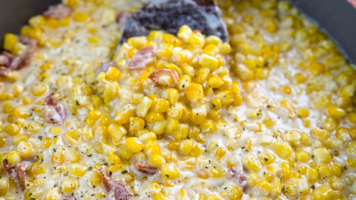 southern creamed corn in a spoon and skillet