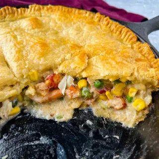 seafood pot pie baked in a cast iron skillet