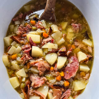 slow cooker ham and potato soup in a Crockpot with vegetables