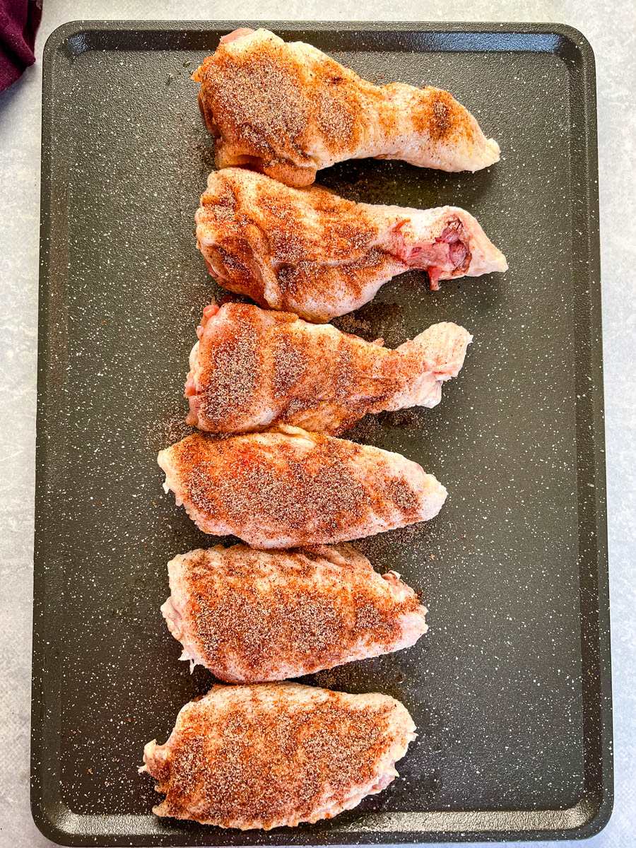 raw, seasoned turkey wings