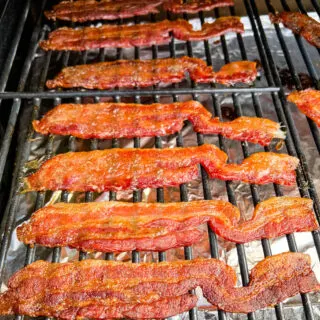 cooked bacon on a Traeger smoker