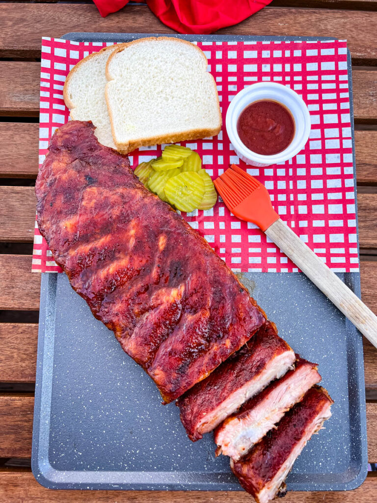 https://www.staysnatched.com/wp-content/uploads/2022/03/traeger-smoked-ribs-3-2-1-method-recipe-3-1-768x1024.jpg