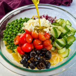 salad with Italian Vinaigrette dressing drizzled over a salad