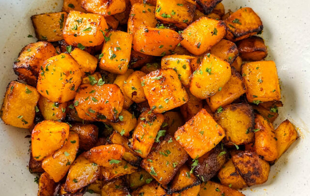 air fryer butternut squash in a white bowl