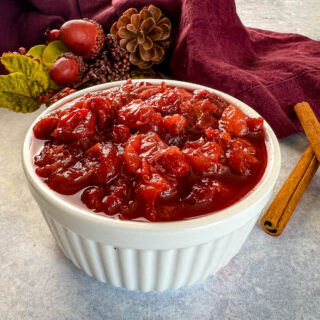 slow cooker Crockpot pot homemade cranberry sauce in a white bowl