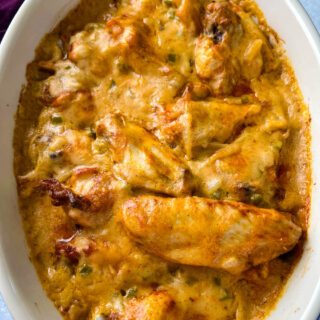 smothered chicken wings in a baking dish