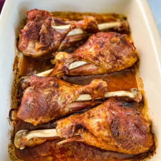 baked turkey legs in a baking dish