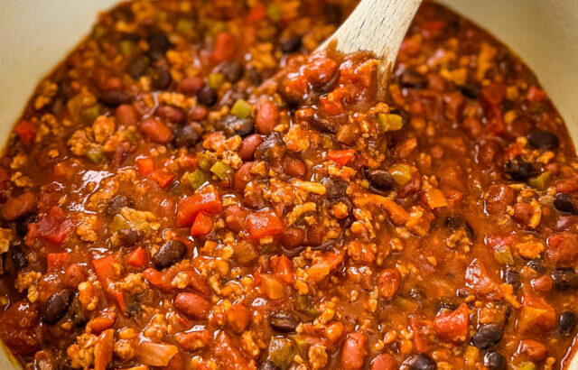 ground chicken chili with beans in a Dutch oven