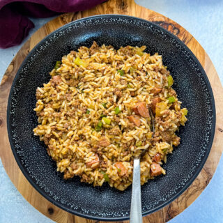 Cajun dirty rice in a black bowl