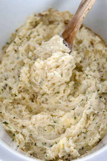 mashed potatoes in a Crockpot slow cooker with butter