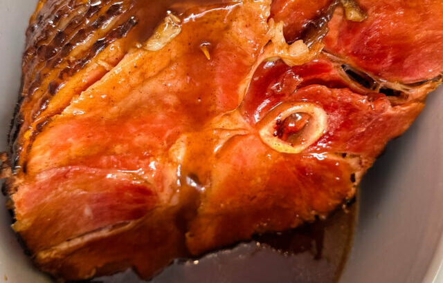 ham in a slow cooker Crockpot glazed with honey and brown sugar