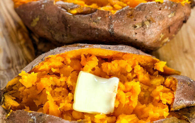 smoked sweet potatoes in butter on a flat surface