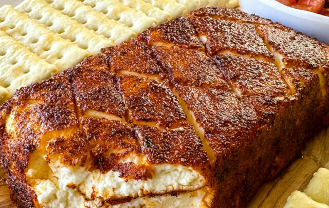 smoked cream cheese on a plate with club crackers