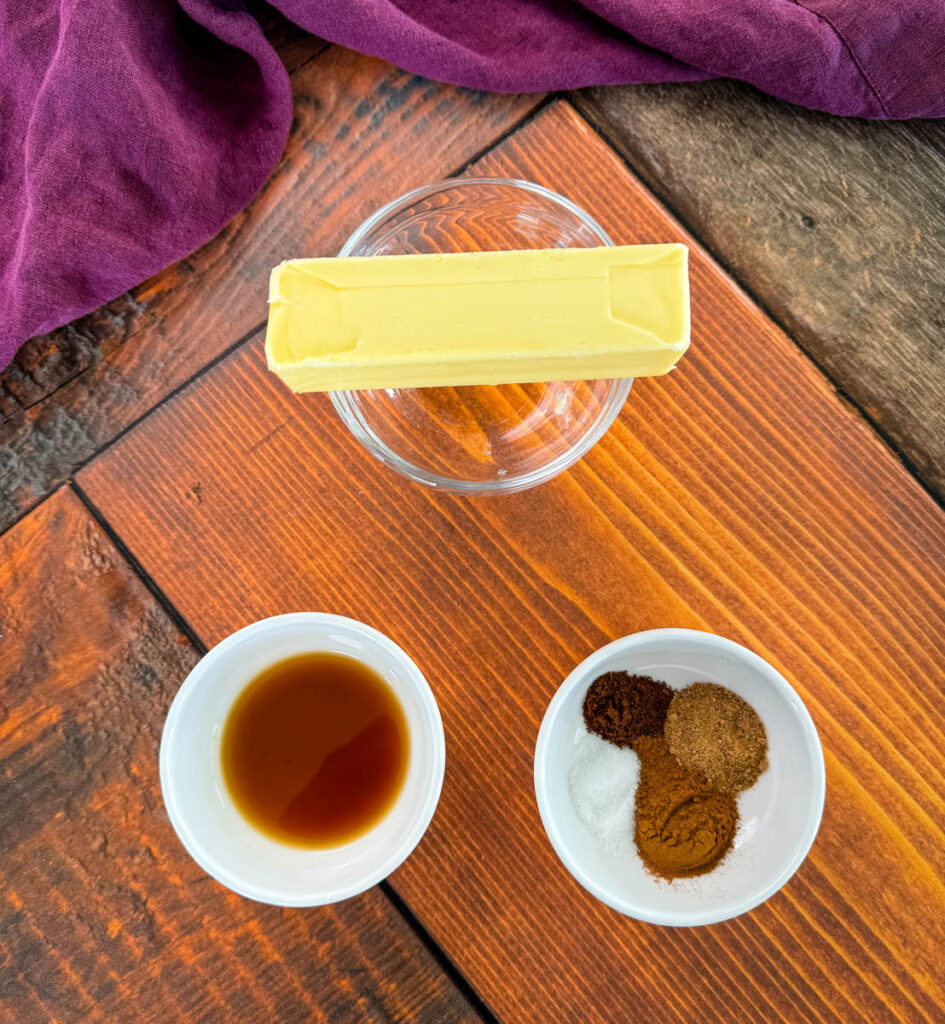 butter, vanilla extract, cinnamon, nutmeg, and cloves in separate bowls