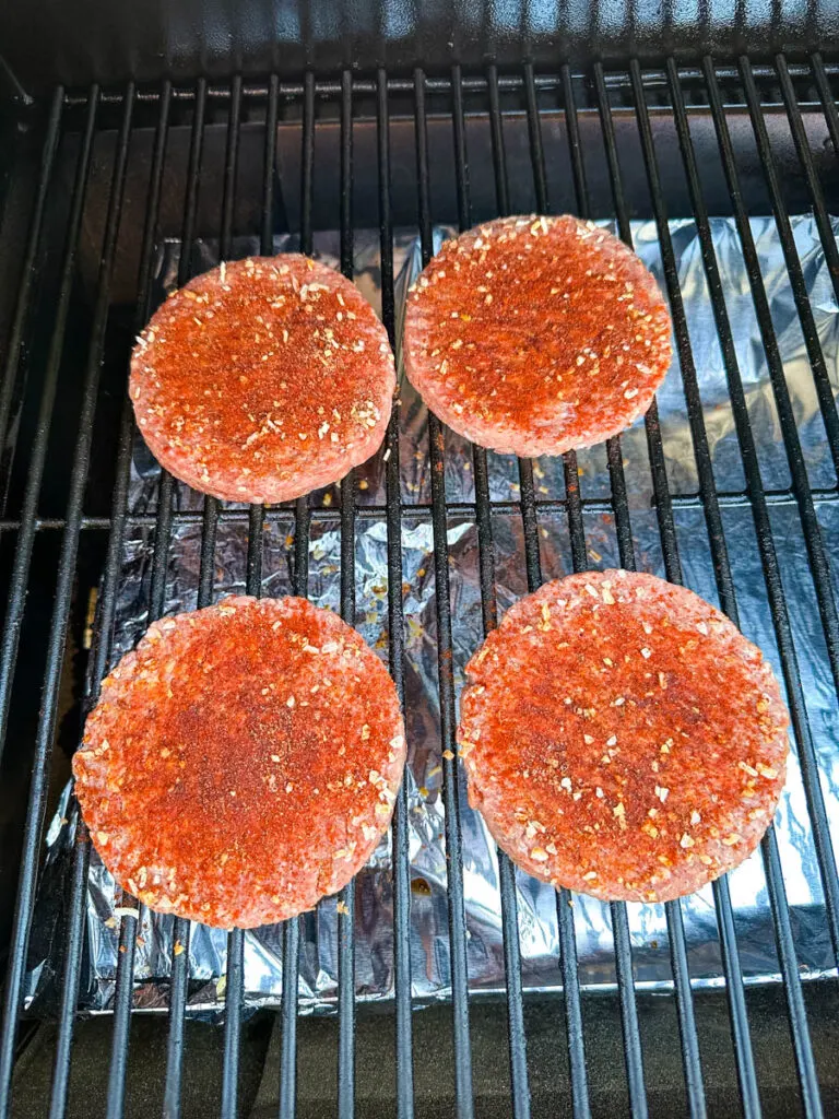 https://www.staysnatched.com/wp-content/uploads/2023/04/traeger-smoked-burgers-recipe-with-cheese-5-1-768x1024.jpg.webp