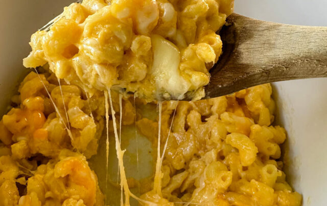 a wooden spoonful of slow cooker Crockpot mac and cheese