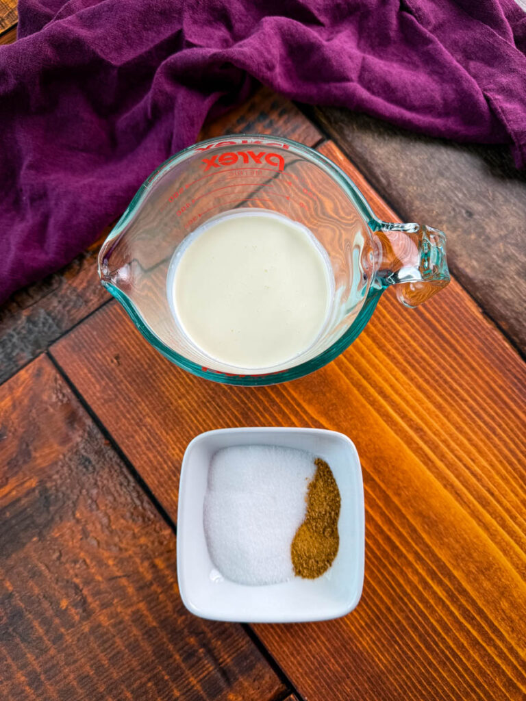 heavy cream, sugar, and Creole seasoning in separate bowls