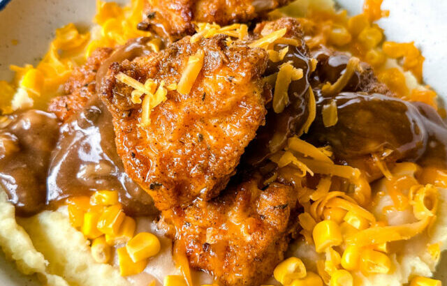 KFC famous mashed potatoes bowl with chicken, gravy, and cheese