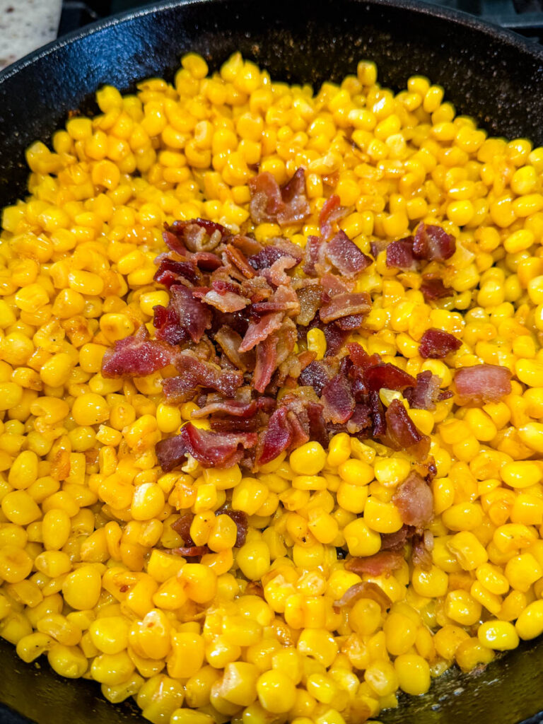 Southern fried corn with bacon in a cast iron skillet