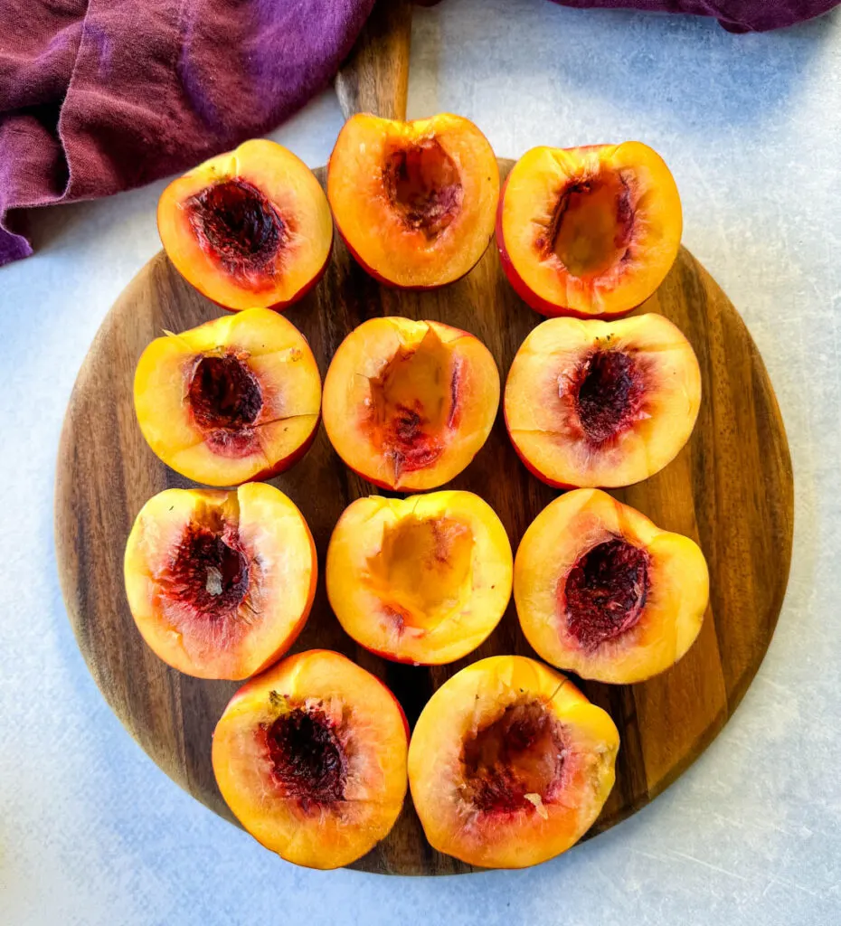 sliced fresh peaches on a flat surface